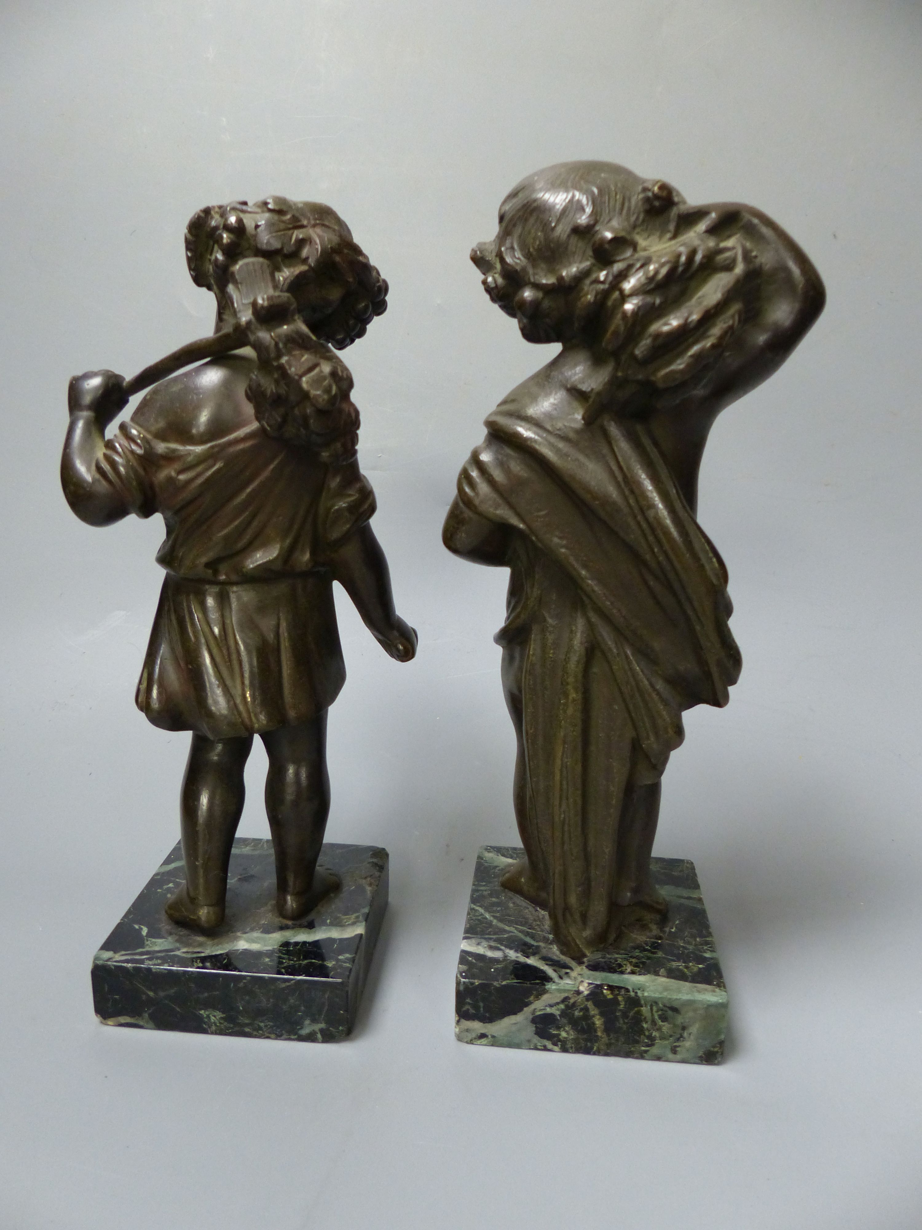 A pair of 19th century bronze figures emblematic of Summer & Autumn, on marble bases, overall 21cm